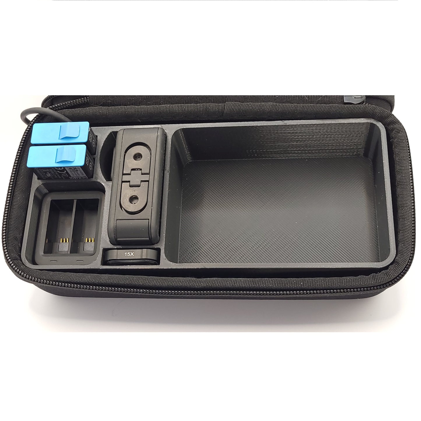 Black GoPro Case Organizer displayed in hard shell case with camera and charger | Charge Batteries on the Go | Customizable Colors | Sturdy Protection | AirTag Slot | PLA or Heat Resistant PETG